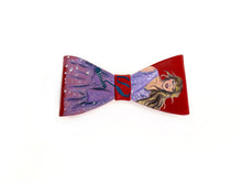 Load image into Gallery viewer, Bow clips with a design of taylor swift on red background
