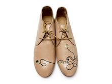 Load image into Gallery viewer, Handcrafted Italian beige footwear adorned with abstract curved lines in a clean minimalist style