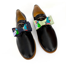 Load image into Gallery viewer, Handcrafted Italian black bow with an artistic Cubist pattern