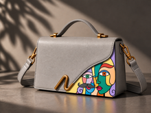 Load image into Gallery viewer, Signature N Braque gray leather bag with cubist portrait artwork and gold-tone n clip