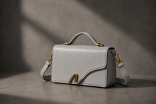 Load image into Gallery viewer, Signature N crossbody bag in light grey Napa leather with gold N-shaped hardware