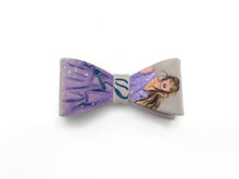 Load image into Gallery viewer, Bow tie with a design of taylor swift on a gray background
