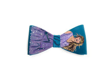 Load image into Gallery viewer, Bow clips with a design of taylor swift on teal background
