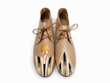 Load image into Gallery viewer, Masquerade hand-painted beige chukkas with Art Deco portrait design
