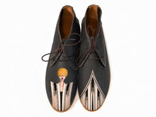 Load image into Gallery viewer, Masquerade hand-painted charcoal chukkas with Art Deco portrait design
